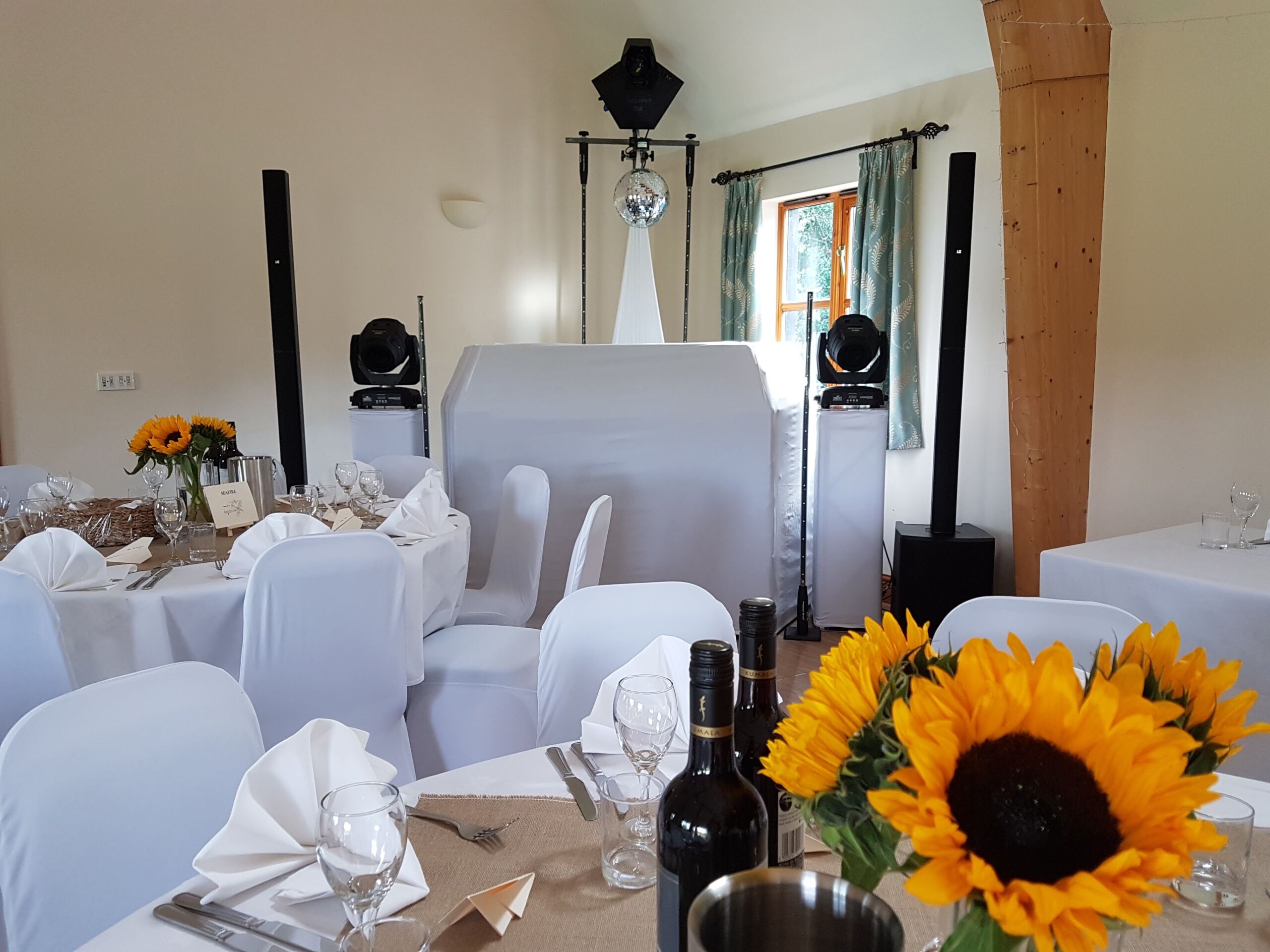 Mobile disco with white DJ booth