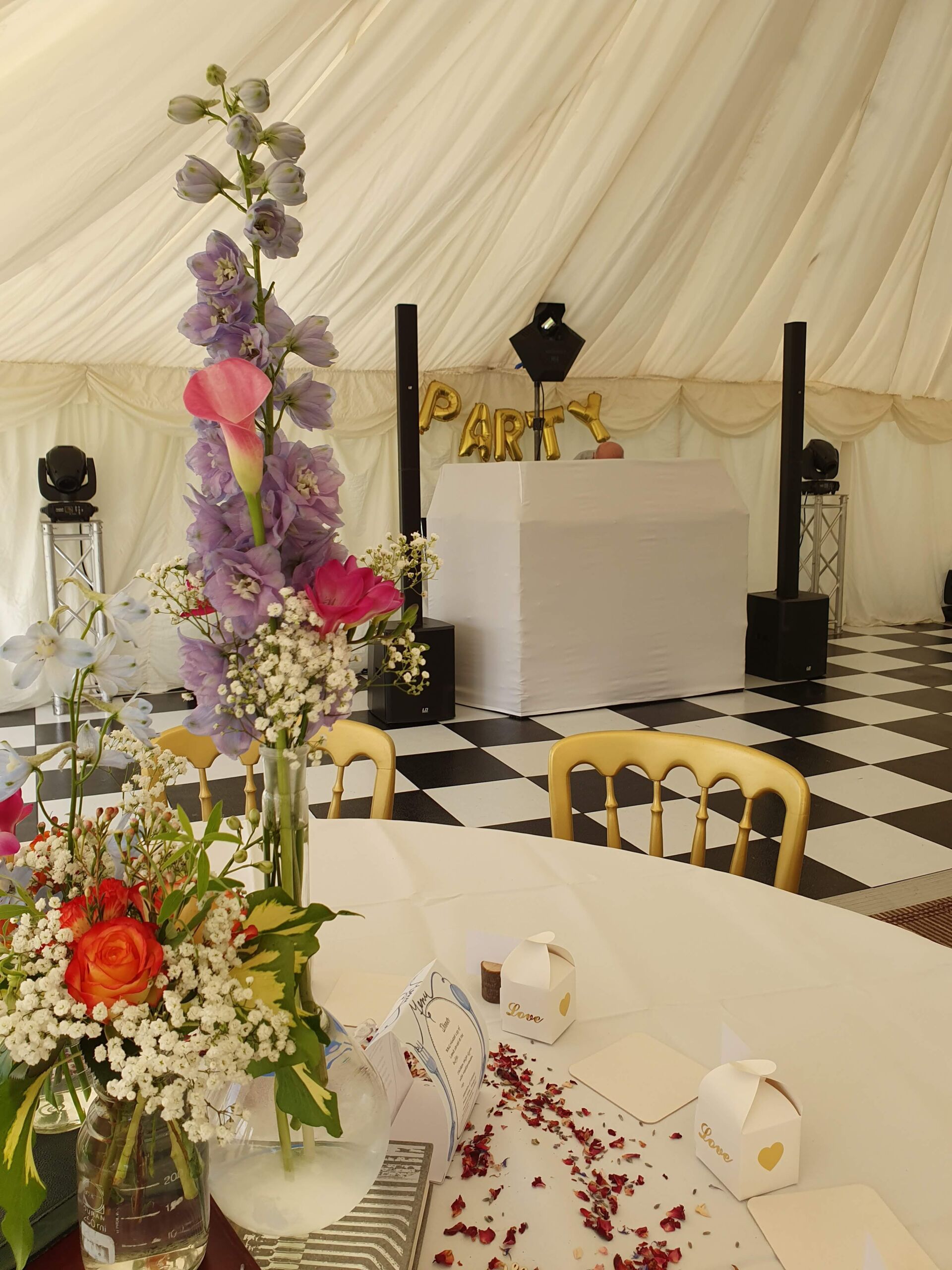 White mobile disco set up with gold Party balloons