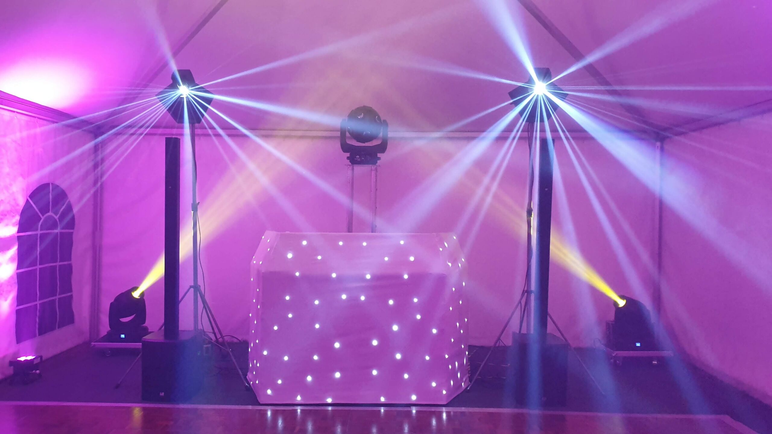 Pink mobile disco set up with lighting effects